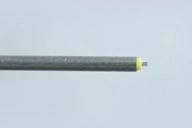 Silver wire with two wrapper of color black and yellow.