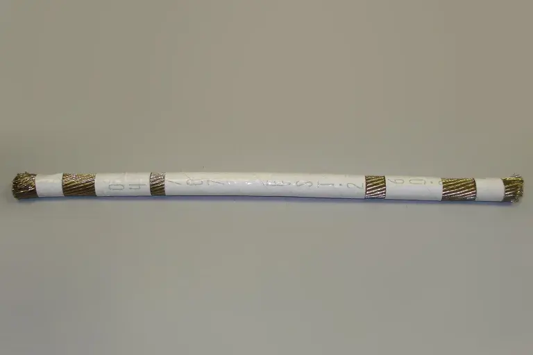 04/07 EST 2 60 White colored wrapper for golden wire.